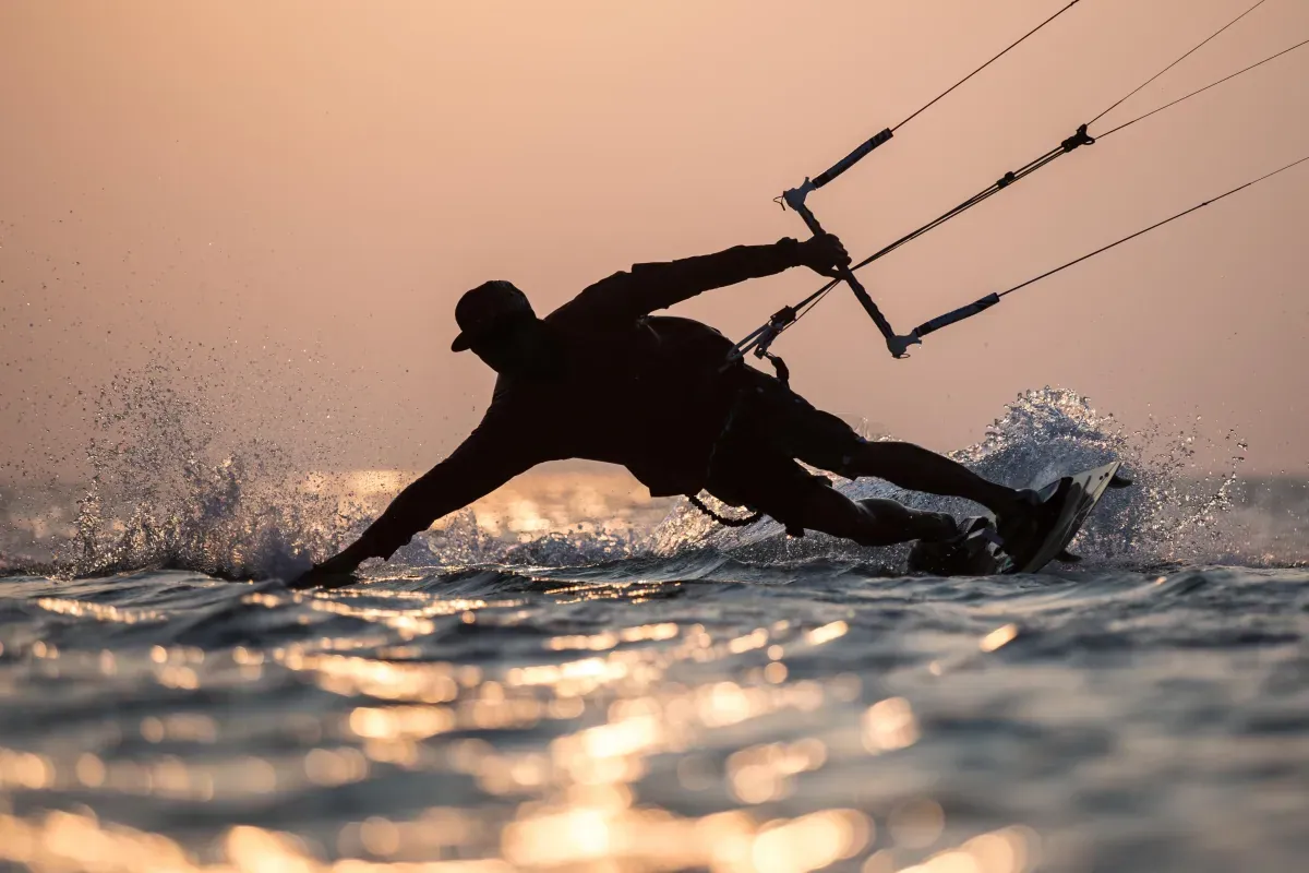 Kitesurfers on the waves off Sunset Beach, Cape Town